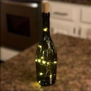 Fairy lights in wine bottle